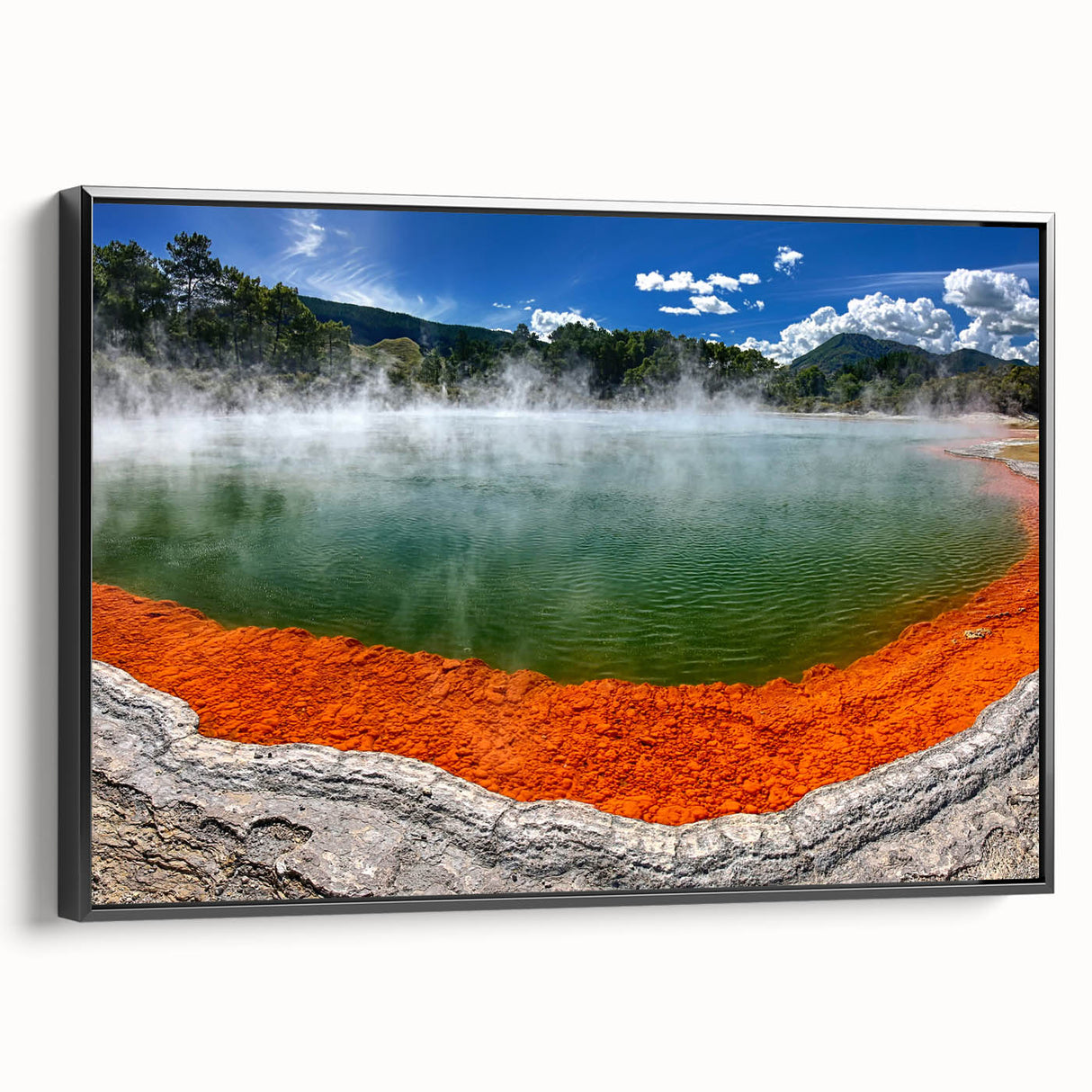 Framed canvas wall art featuring a serene hot spring landscape design, showcasing calming colors of blue and green, set against a black frame for modern decor.