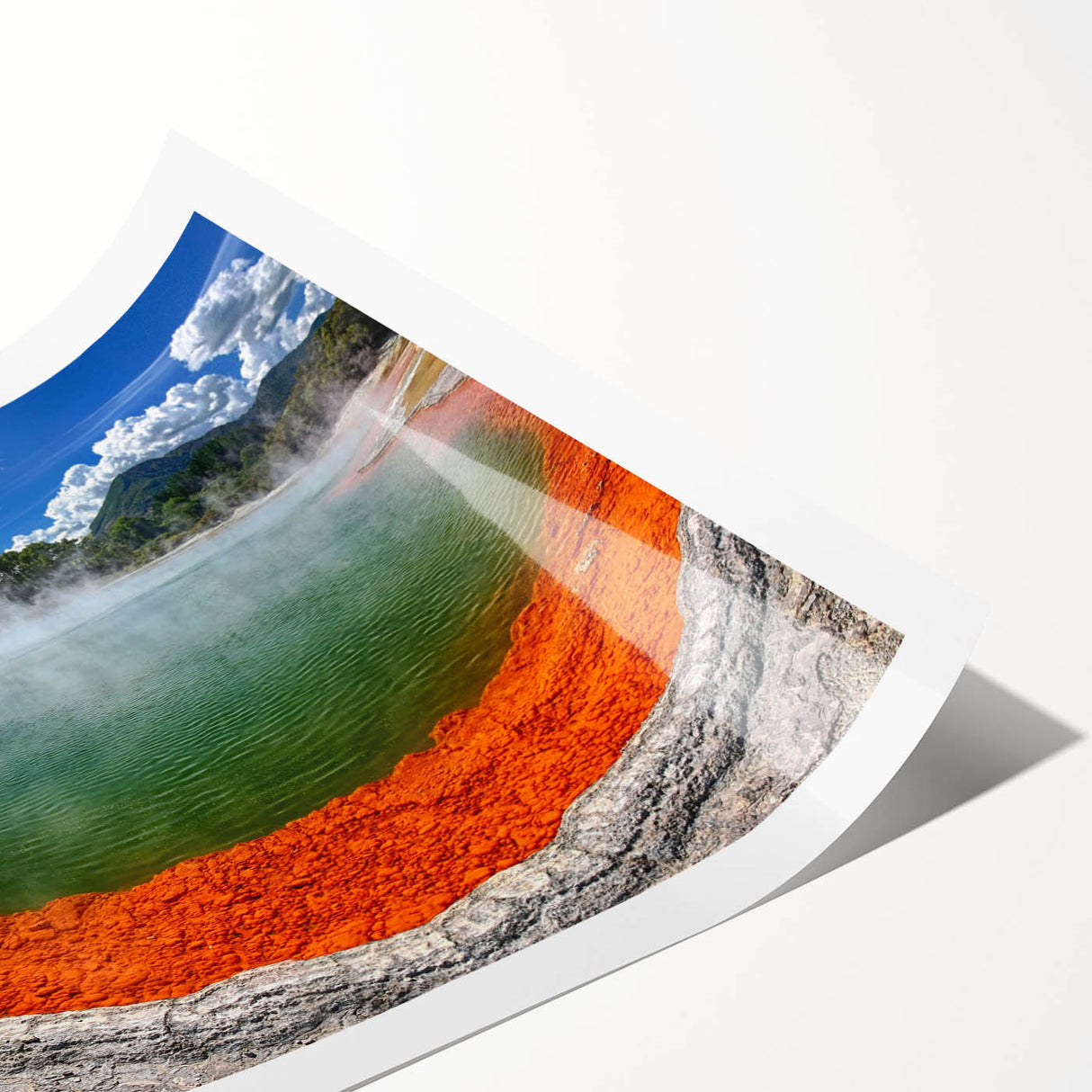 Vibrant landscape wall art print showcasing a serene hot spring surrounded by lush greenery, rolled for easy shipping and display in any home decor.