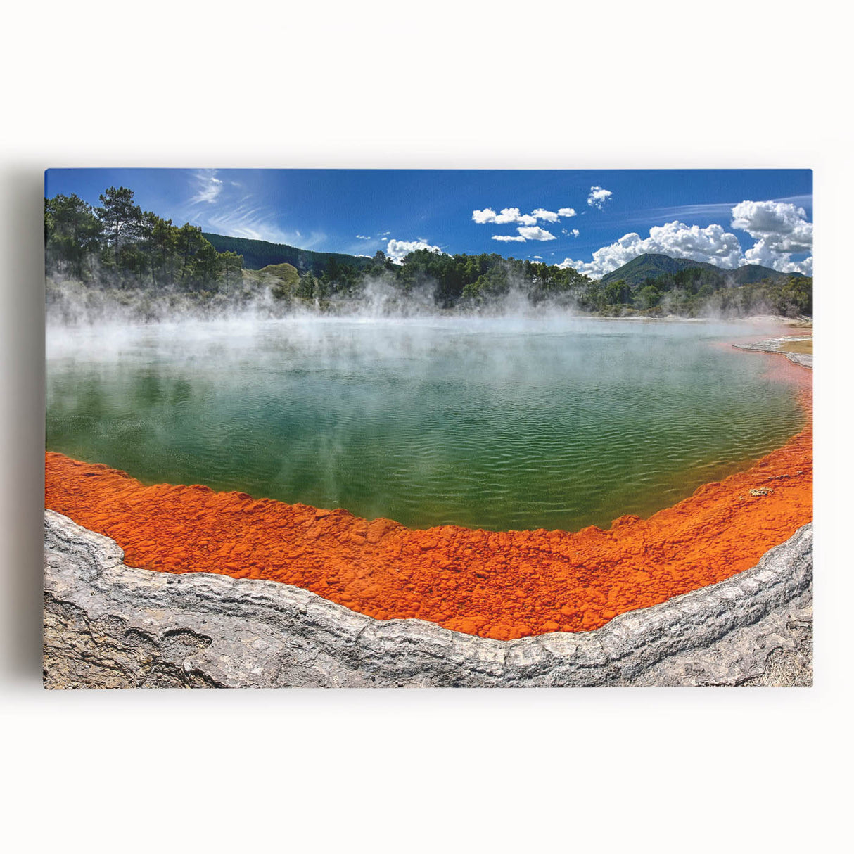 Stretched canvas artwork showcasing a serene hot spring landscape with lush greenery and vibrant blue water, perfect for home decor and relaxation themes.