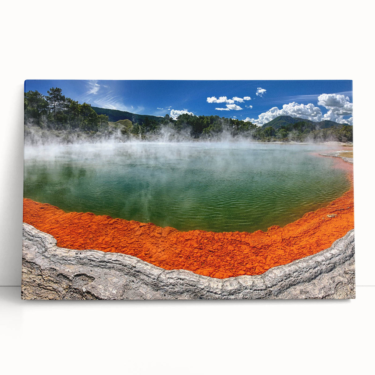 Stretched canvas wall art showcasing a serene hot spring landscape design, featuring vibrant green foliage and tranquil blue waters, perfect for home decor.