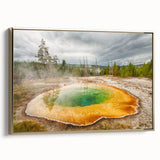 Framed canvas wall art depicting a serene hot spring landscape with vibrant colors and intricate details, featuring a luxurious gold frame that enhances its elegance. Perfect for home decor, this piece brings a tranquil atmosphere to any room.