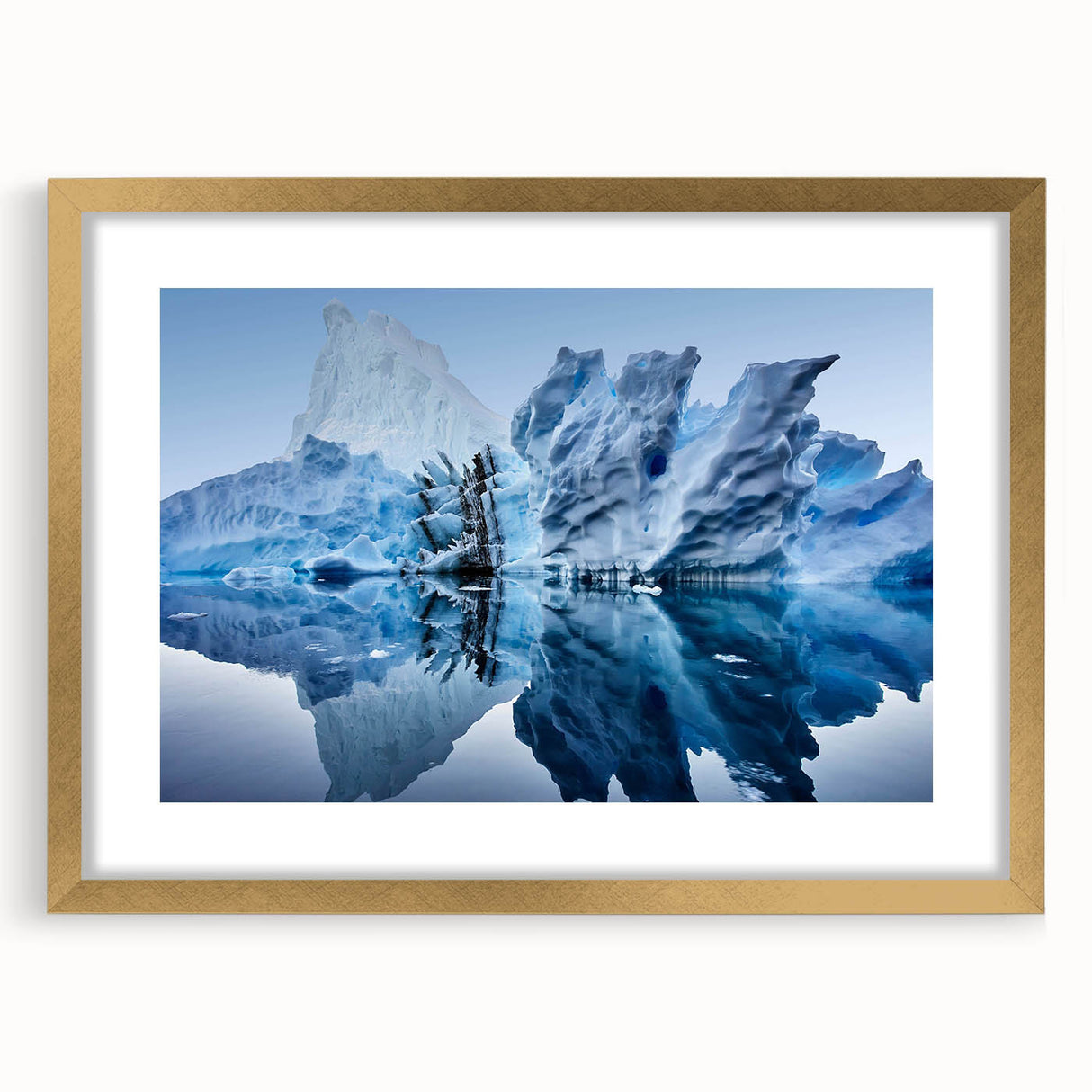 Framed wall art piece showcasing a stunning iceberg landscape design with a gold mat, perfect for modern decor, highlighting cool tones and serene beauty.