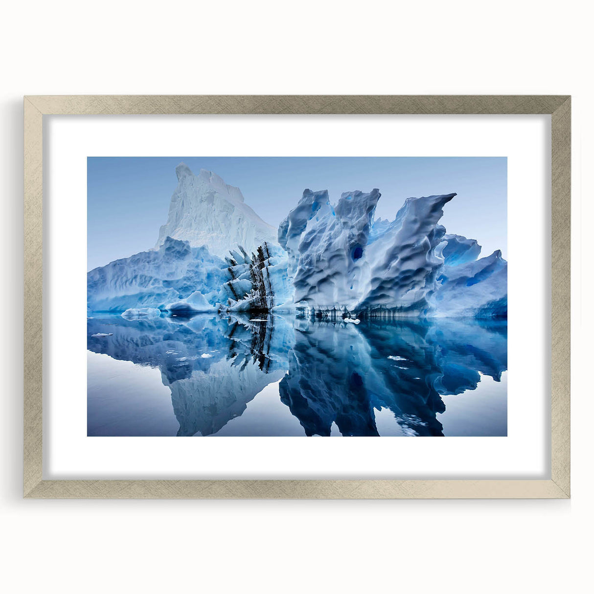 Framed wall art featuring a stunning iceberg landscape design, with a silver frame and mat, perfect for enhancing modern home decor. Ideal for nature lovers.