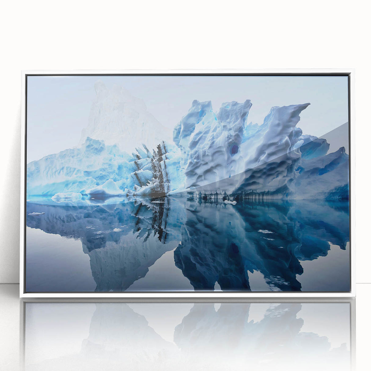 Framed wall art featuring a striking iceberg design, set in a white frame, perfect for modern home decor. This piece adds a serene, icy aesthetic to any living space.