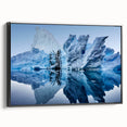 Framed canvas wall art showcasing a stunning iceberg landscape design with a black frame, ideal for modern home decor, emphasizing cool tones and nature's beauty.