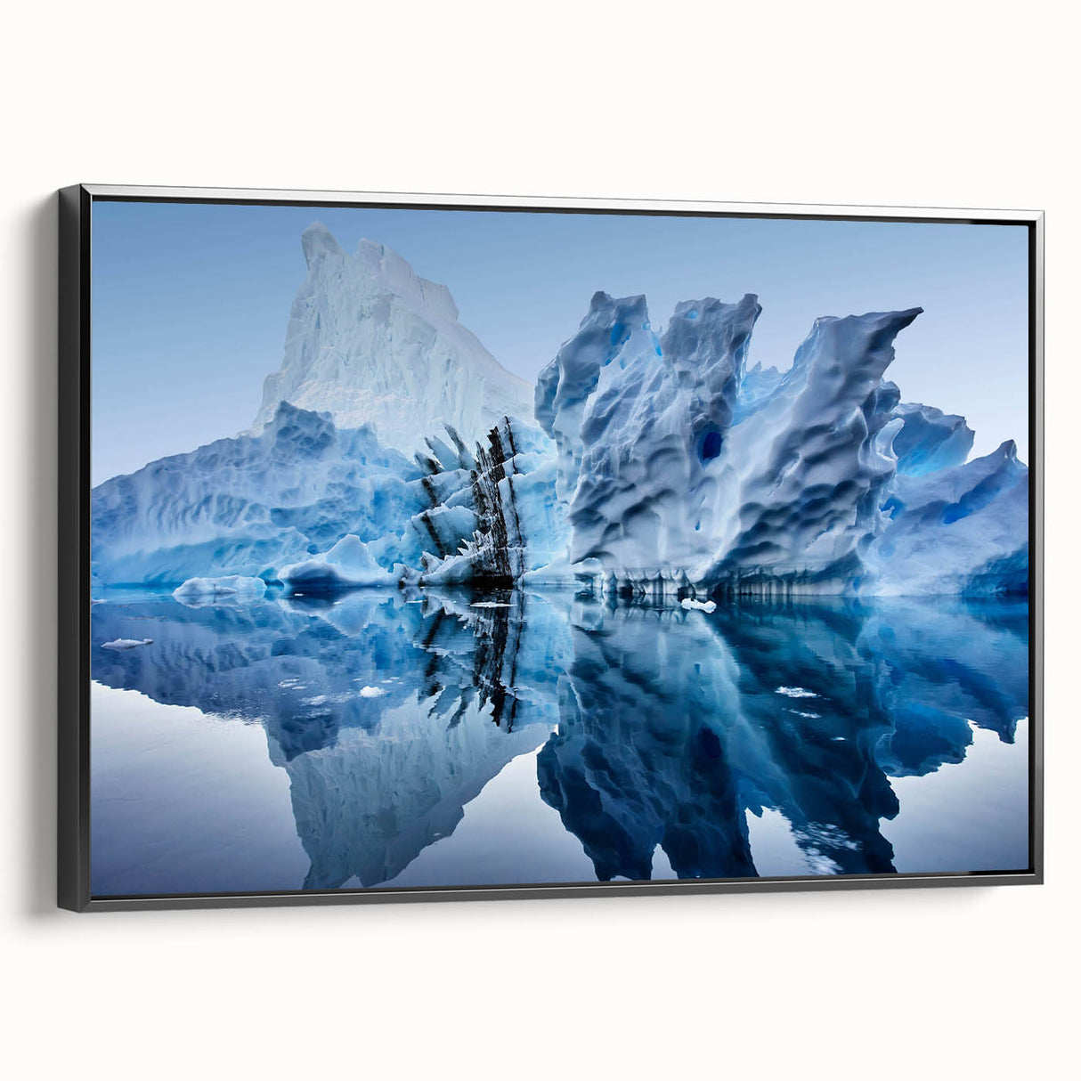 Framed canvas wall art showcasing a stunning iceberg landscape design with a black frame, ideal for modern home decor, emphasizing cool tones and nature's beauty.