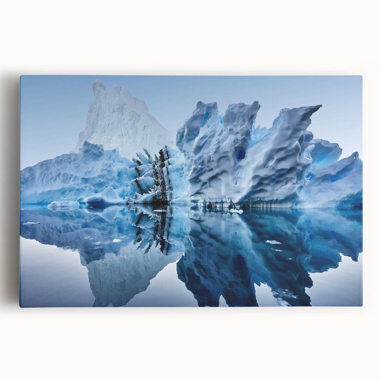 Stretched canvas wall art featuring a serene iceberg landscape design with cool blue tones, perfect for modern home decor and enhancing tranquility in any room.