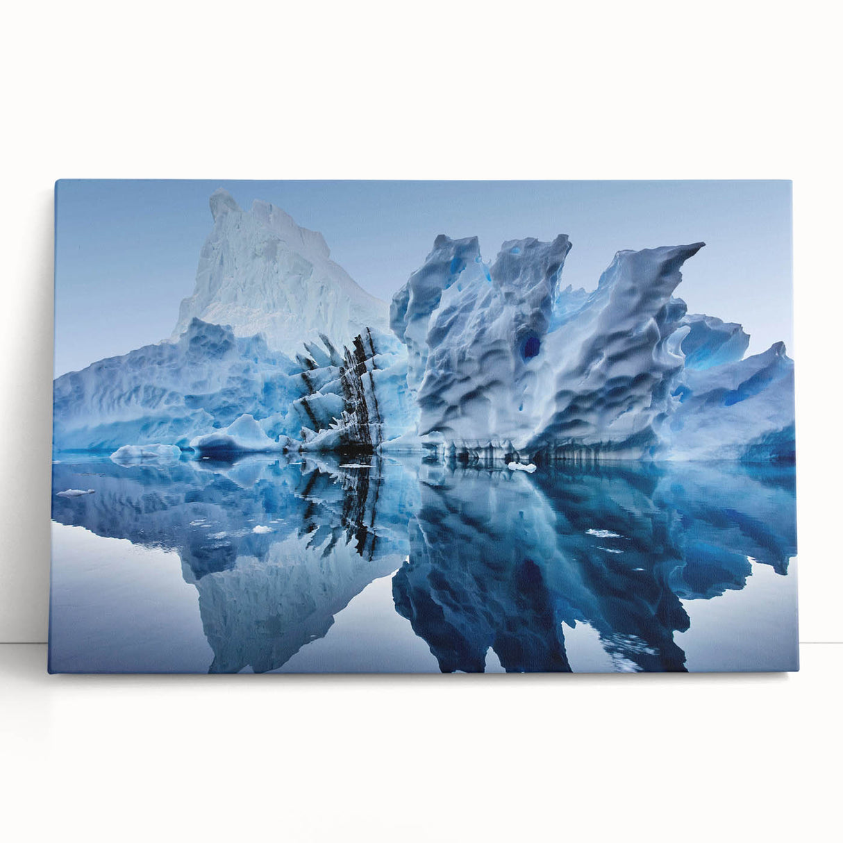 Stretched canvas wall art showcasing a stunning iceberg landscape design in cool blue and white tones, perfect for modern home decor. Ideal for adding a serene touch to any room.