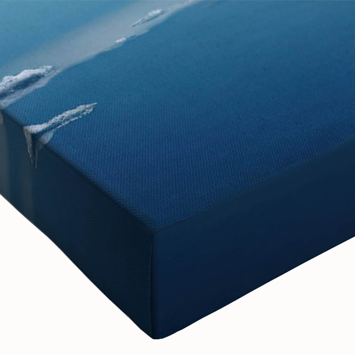 Close-up of a stretched canvas wall art piece showcasing a vibrant iceberg landscape design, featuring deep blues and whites, perfect for modern home decor.