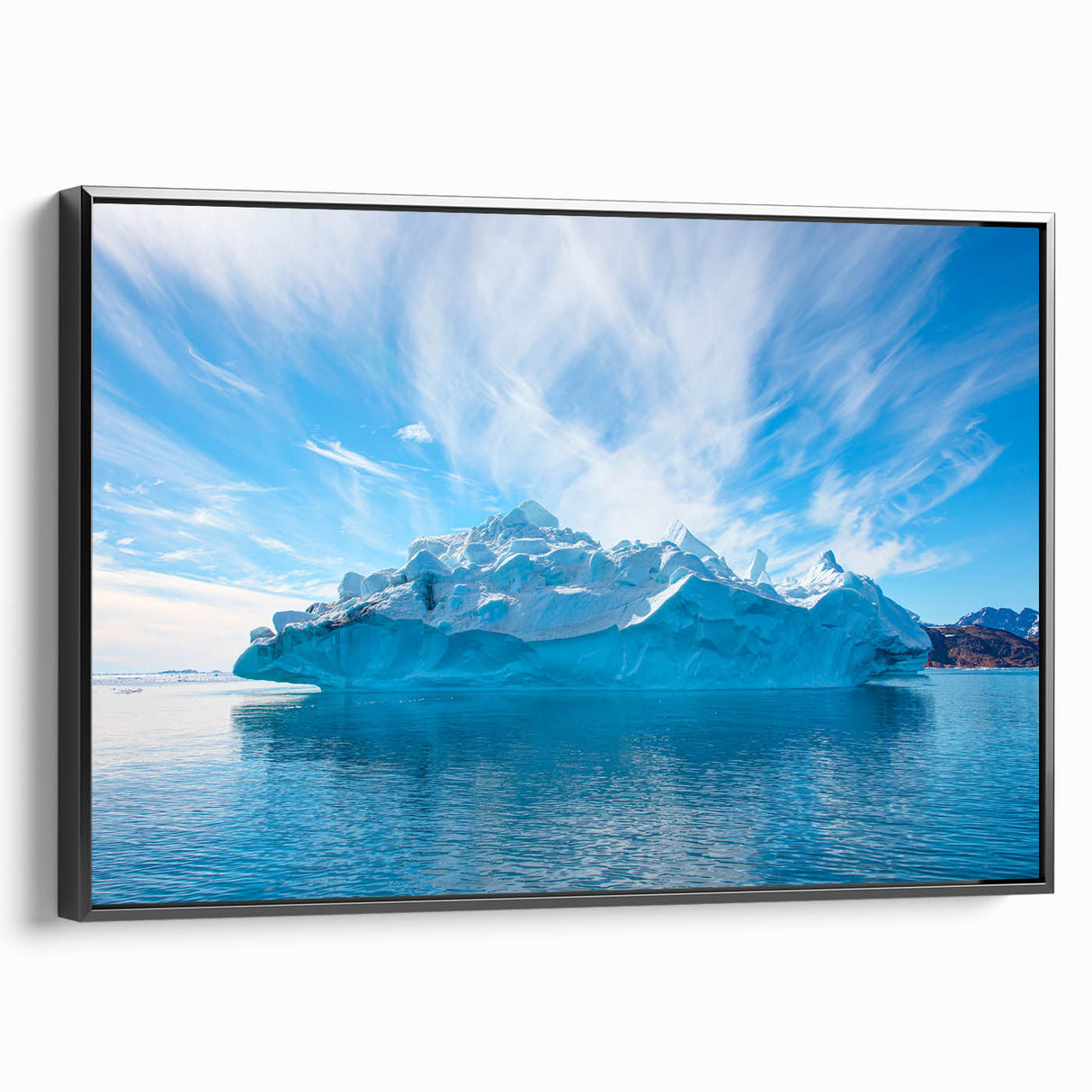 Framed canvas wall art showcasing a stunning iceberg landscape design with vibrant blue tones, displayed from a side angle against a neutral background. Perfect for modern decor.