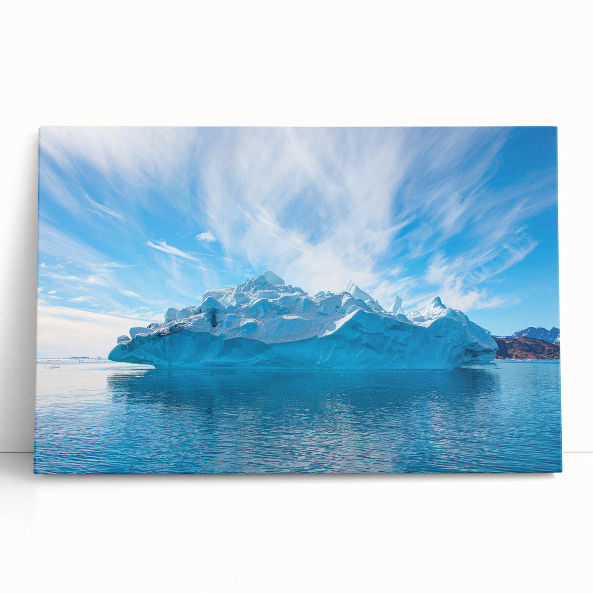 Stretched canvas wall art featuring a stunning iceberg design in cool blue and white hues, perfect for modern home decor. Adds a serene, icy touch to any room.