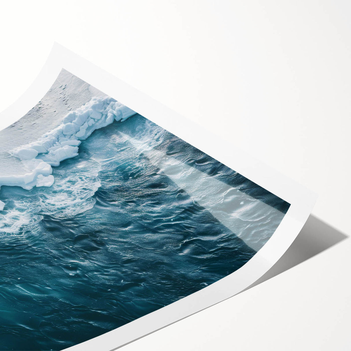 Beautiful iceberg design canvas wall art print showcasing a serene icy landscape in soothing blue and white tones, rolled and ready for display in a cardboard tube.