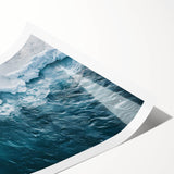 Beautiful iceberg design canvas wall art print showcasing a serene icy landscape in soothing blue and white tones, rolled and ready for display in a cardboard tube.