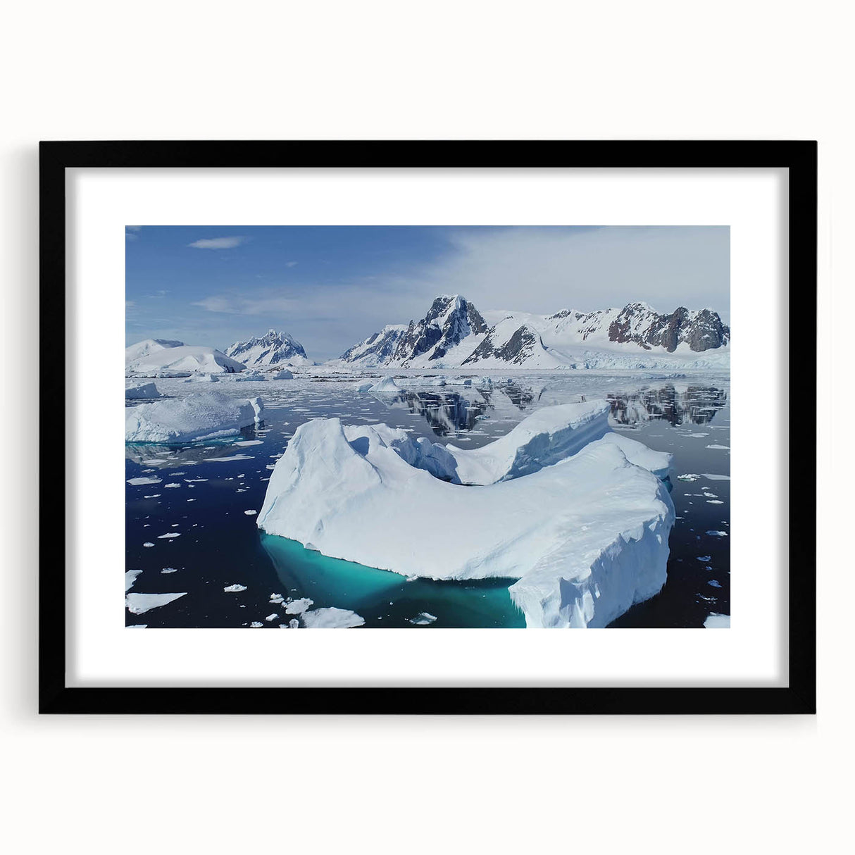 Framed wall art showcasing a stunning iceberg design with a black mat for a modern aesthetic, perfect for enhancing contemporary decor. Ideal for nature lovers.
