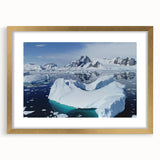 Framed wall art featuring a stunning iceberg landscape design, accented with a gold frame and mat, showcasing intricate details and vibrant colors, ideal for modern decor.