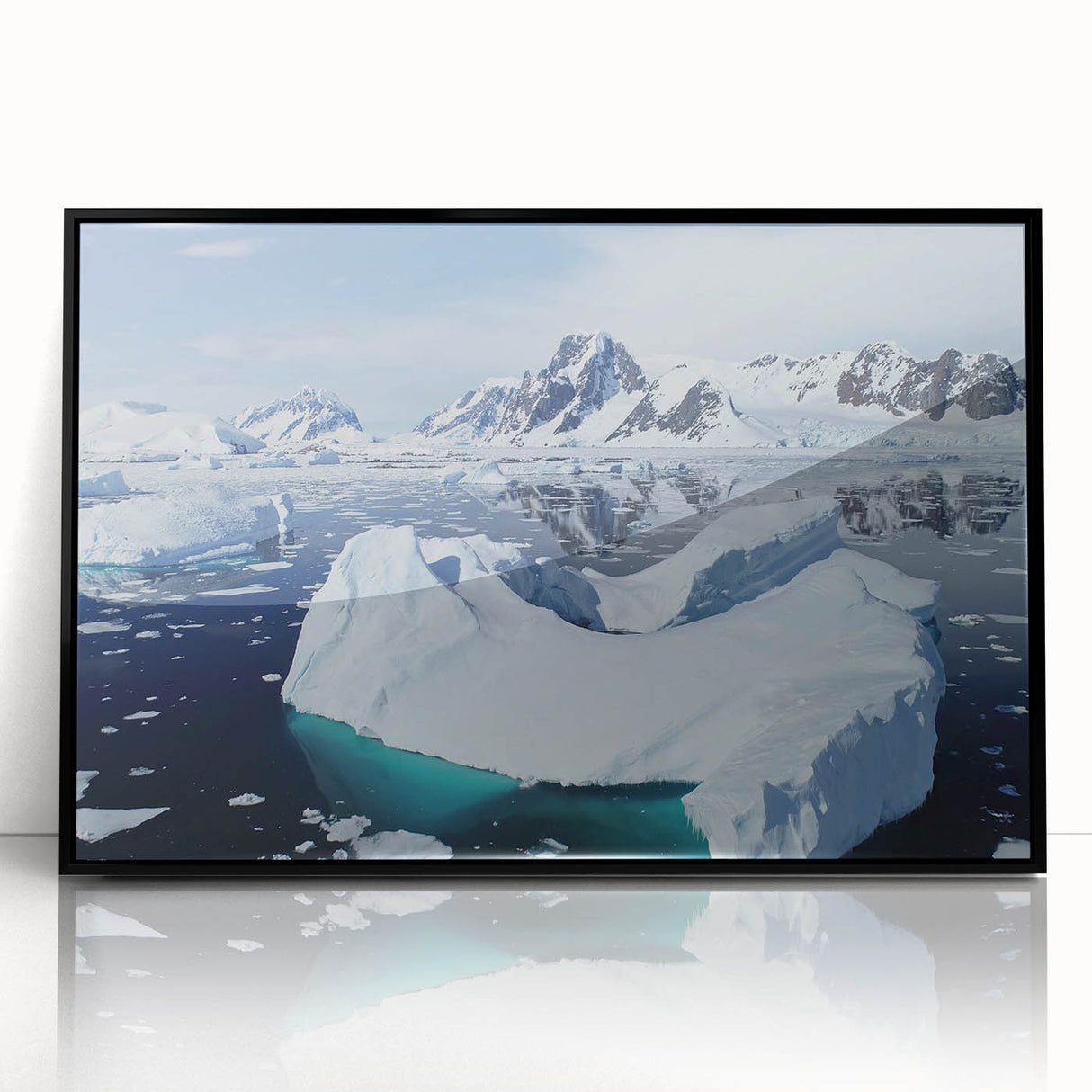 Framed acrylic wall art depicting a stunning iceberg landscape design, featuring vibrant blues and whites, set in a sleek black frame for a modern touch. Perfect for enhancing contemporary home decor.