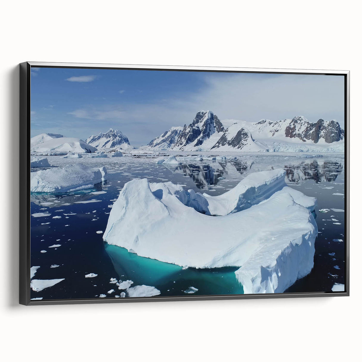 Framed canvas wall art showcasing a striking iceberg design, featuring cool blue tones and intricate details, perfect for modern home decor.