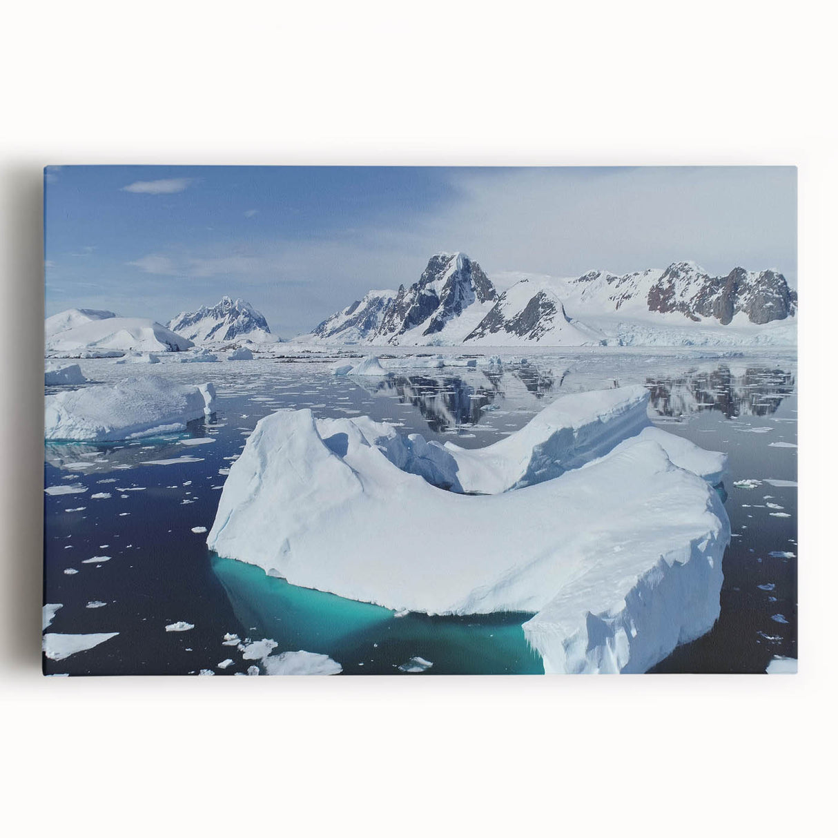 Stretched canvas artwork showcasing a striking iceberg landscape design in vibrant blues and whites, ideal for modern home decor, enhancing any living space with its tranquil beauty.