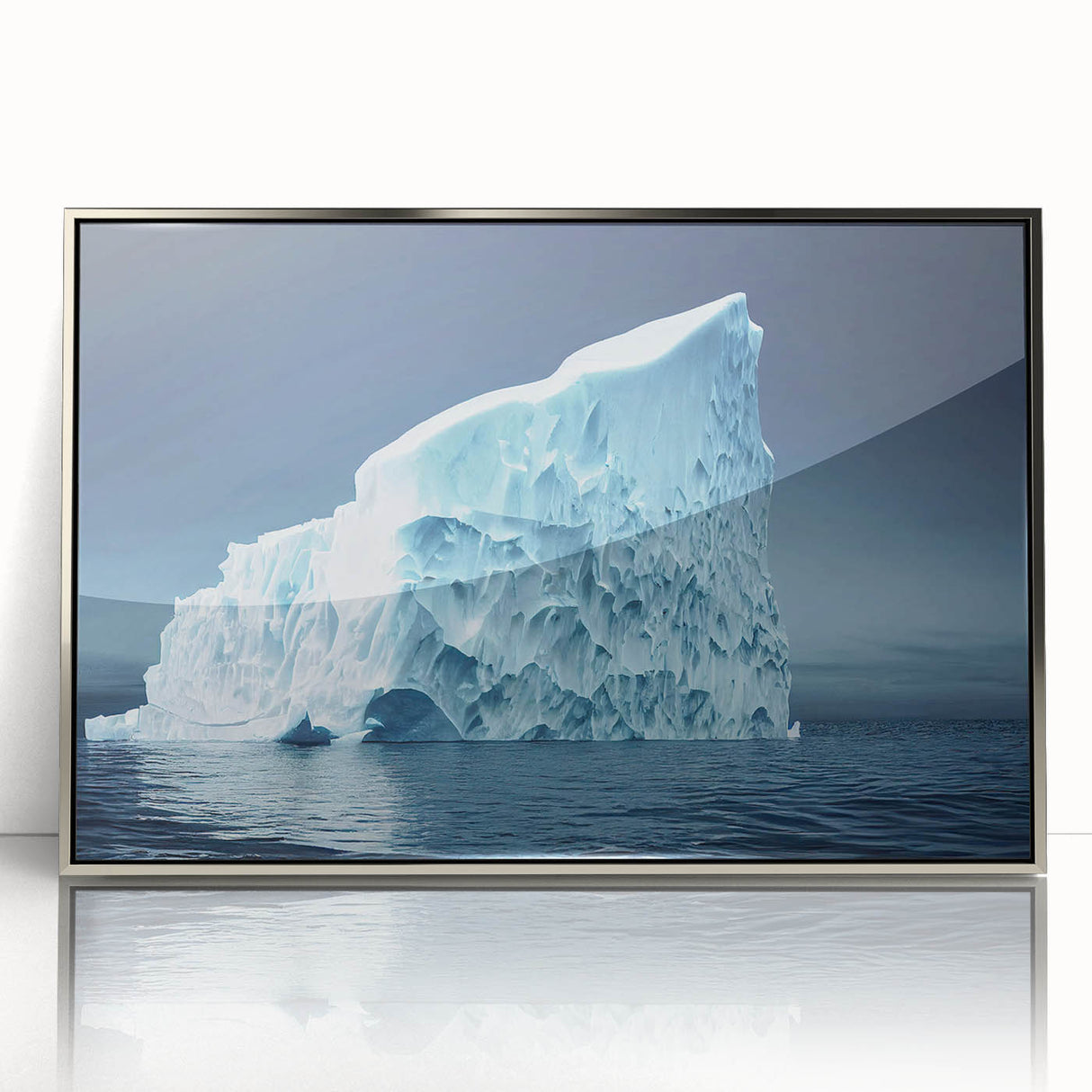 Framed acrylic wall art featuring a stunning iceberg design in silver tones, perfect for modern decor. The artwork captures the intricate details of ice formations, creating a serene and captivating visual experience for any space.