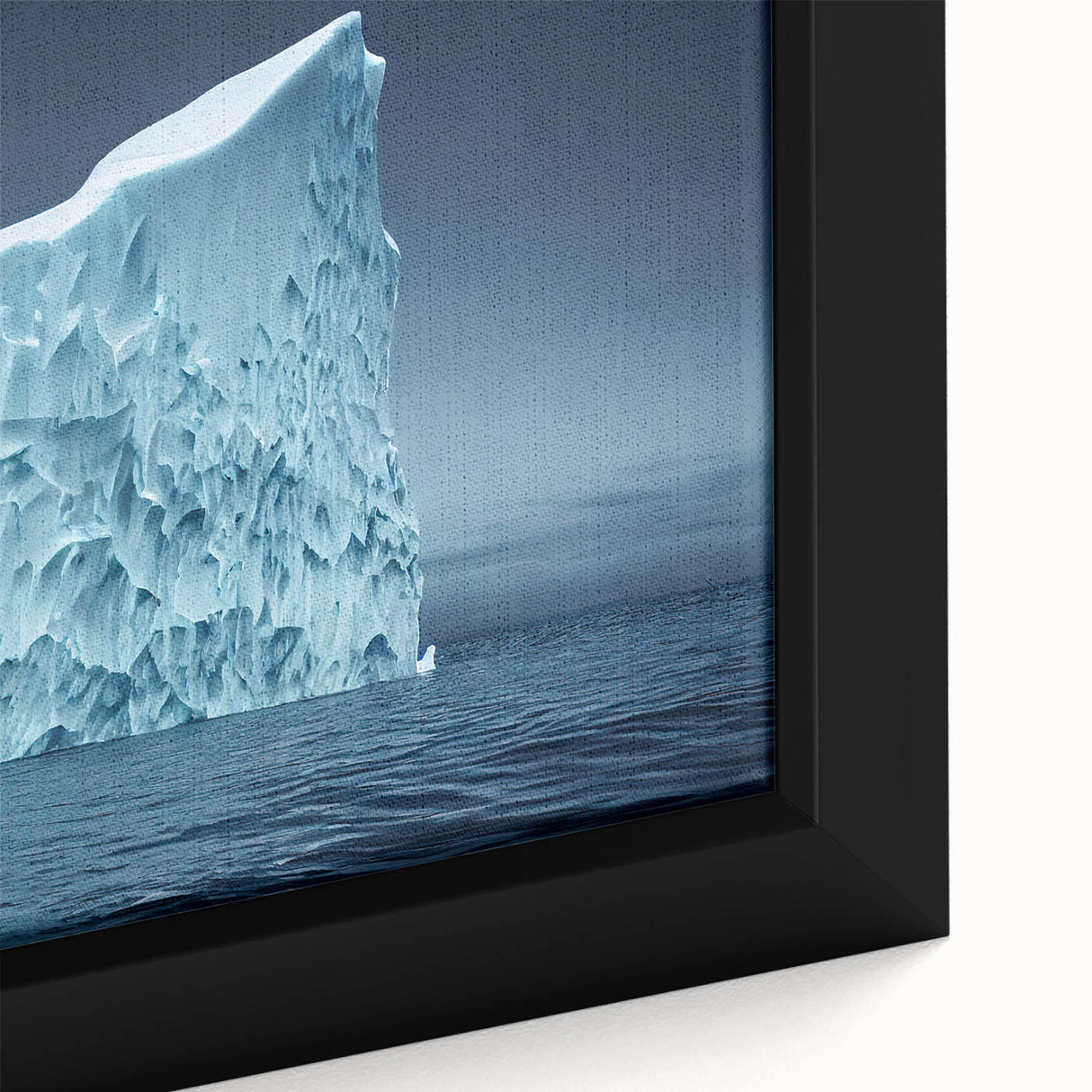 Framed canvas artwork showcasing a stunning close-up of an iceberg design, featuring cool blue tones and intricate textures, perfect for modern home decor.