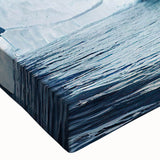 Close-up of a stretched canvas wall art piece showcasing a vibrant iceberg landscape design, featuring cool blue and white hues, perfect for modern home decor.