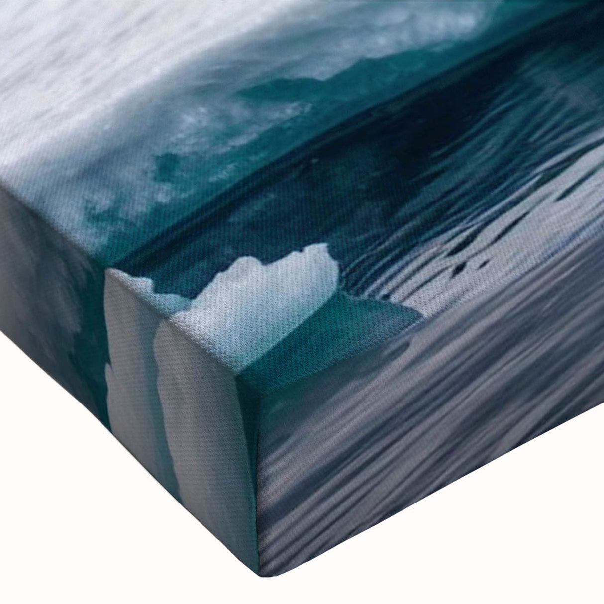 Close-up of a stretched canvas showcasing a vibrant iceberg landscape design, featuring detailed textures and shades of blue and white, ideal for modern home decor.