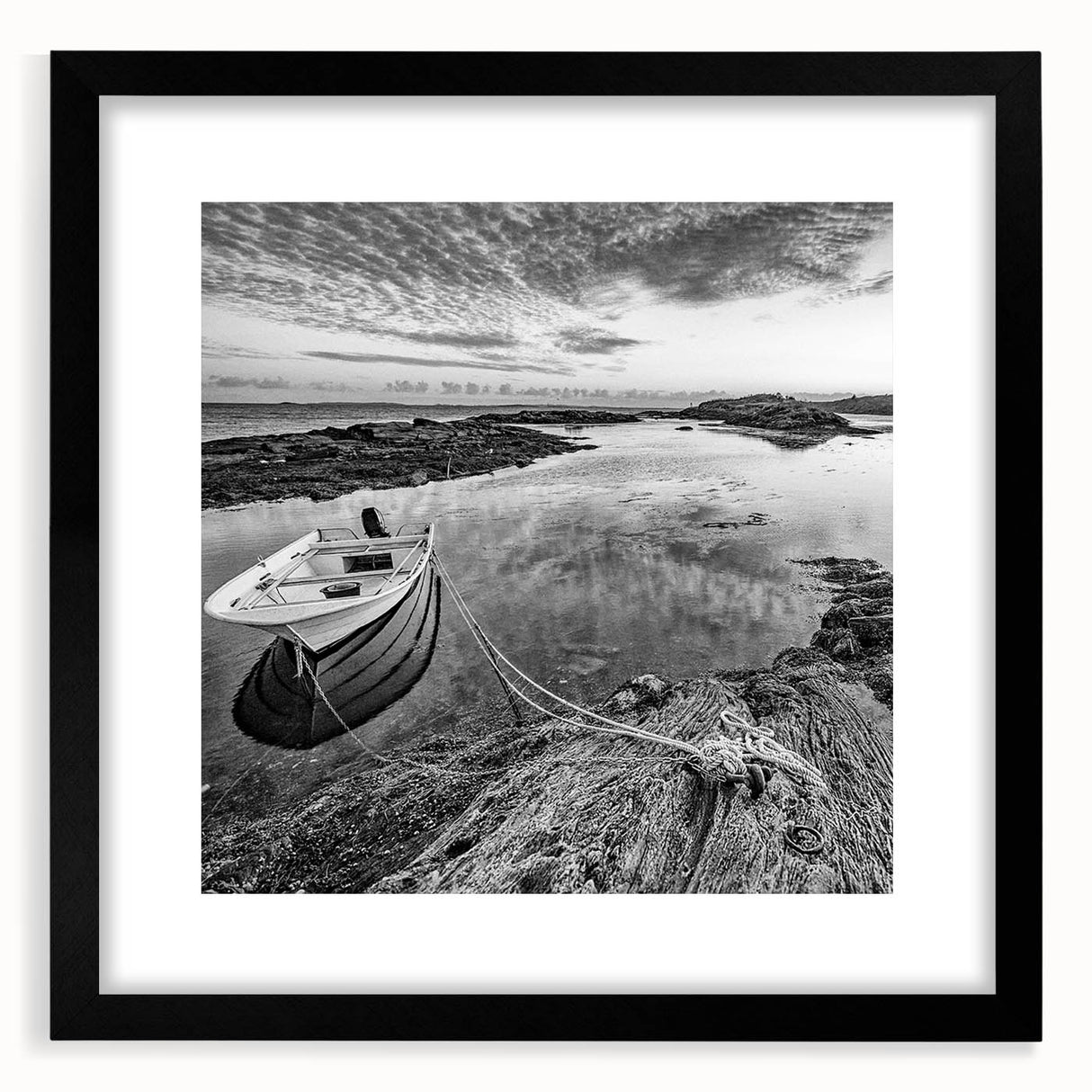 Framed wall art featuring a serene lakeside landscape in muted colors, complete with a black frame and mat for elegant display, ideal for home decor.