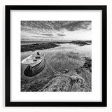 Framed wall art featuring a serene lakeside landscape in muted colors, complete with a black frame and mat for elegant display, ideal for home decor.