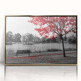 Framed wall art featuring a serene landscape of a tranquil lake surrounded by lush greenery, set in an elegant gold frame, ideal for home decor.