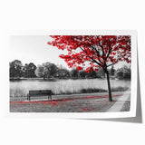 Rolled print of a scenic lake landscape artwork, showcasing vibrant blues and greens, ideal for home decor, packaged securely in a cardboard tube for protection.