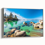 Framed canvas wall art showcasing a serene landscape with a tranquil lake, mountains, and a silver frame, perfect for enhancing home decor aesthetics.