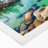 Serene landscape wall art on rolled canvas showcasing a tranquil lake scene surrounded by lush greenery, perfect for enhancing home decor with nature's beauty.