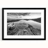 Framed wall art showcasing a serene lakeside landscape in vibrant colors, featuring a black mat and sleek frame, ideal for home decor enhancement.
