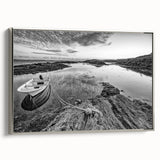 Framed canvas wall art showcasing a serene lake landscape, featuring vibrant blues and greens, with a sleek silver frame, ideal for home decor.