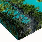 Close-up of a stretched canvas wall art piece showcasing a serene lake landscape with vibrant colors and intricate details, perfect for home decor.