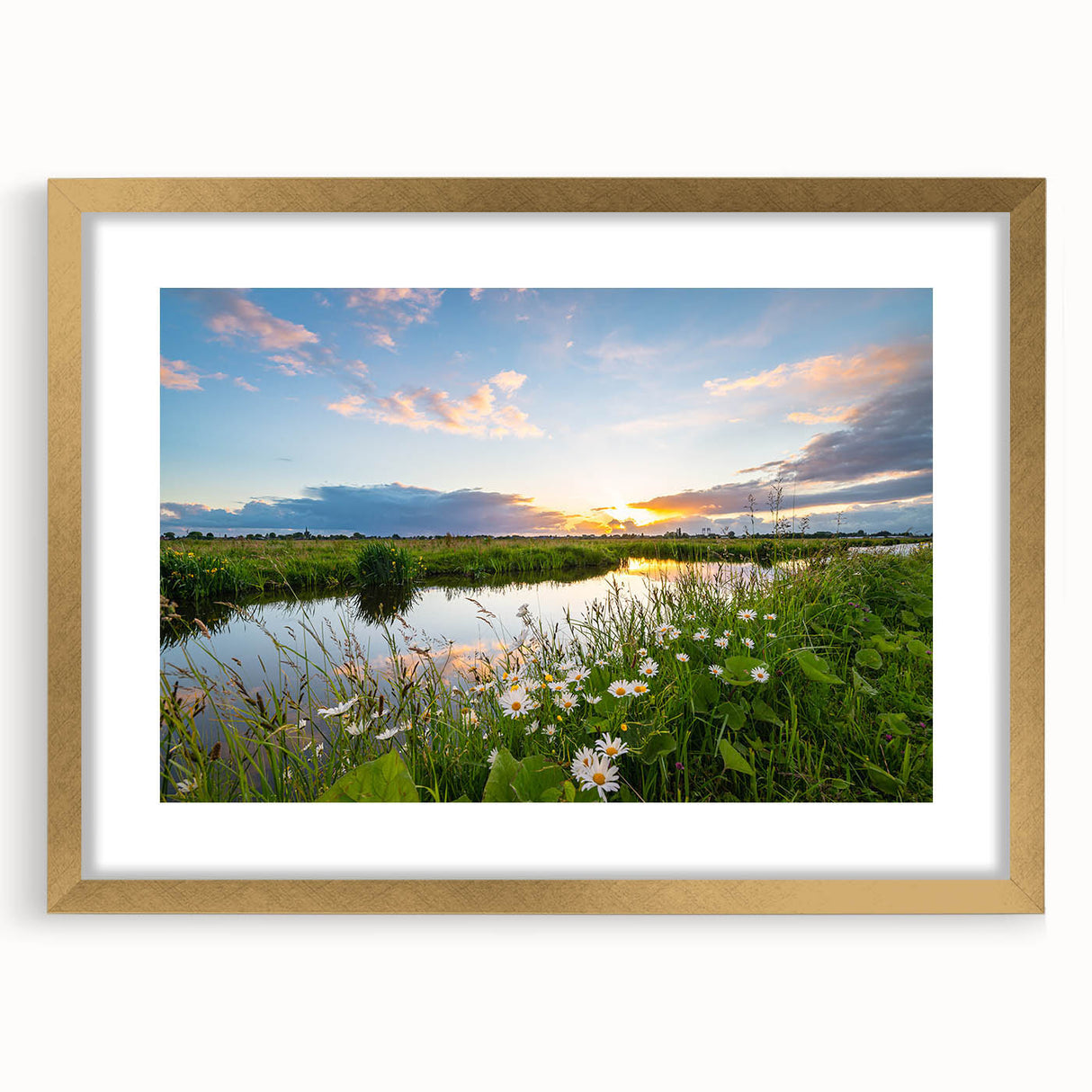 Framed landscape wall art featuring a serene lake scene in soft pastel colors, accented with a gold mat and frame, perfect for home decor.