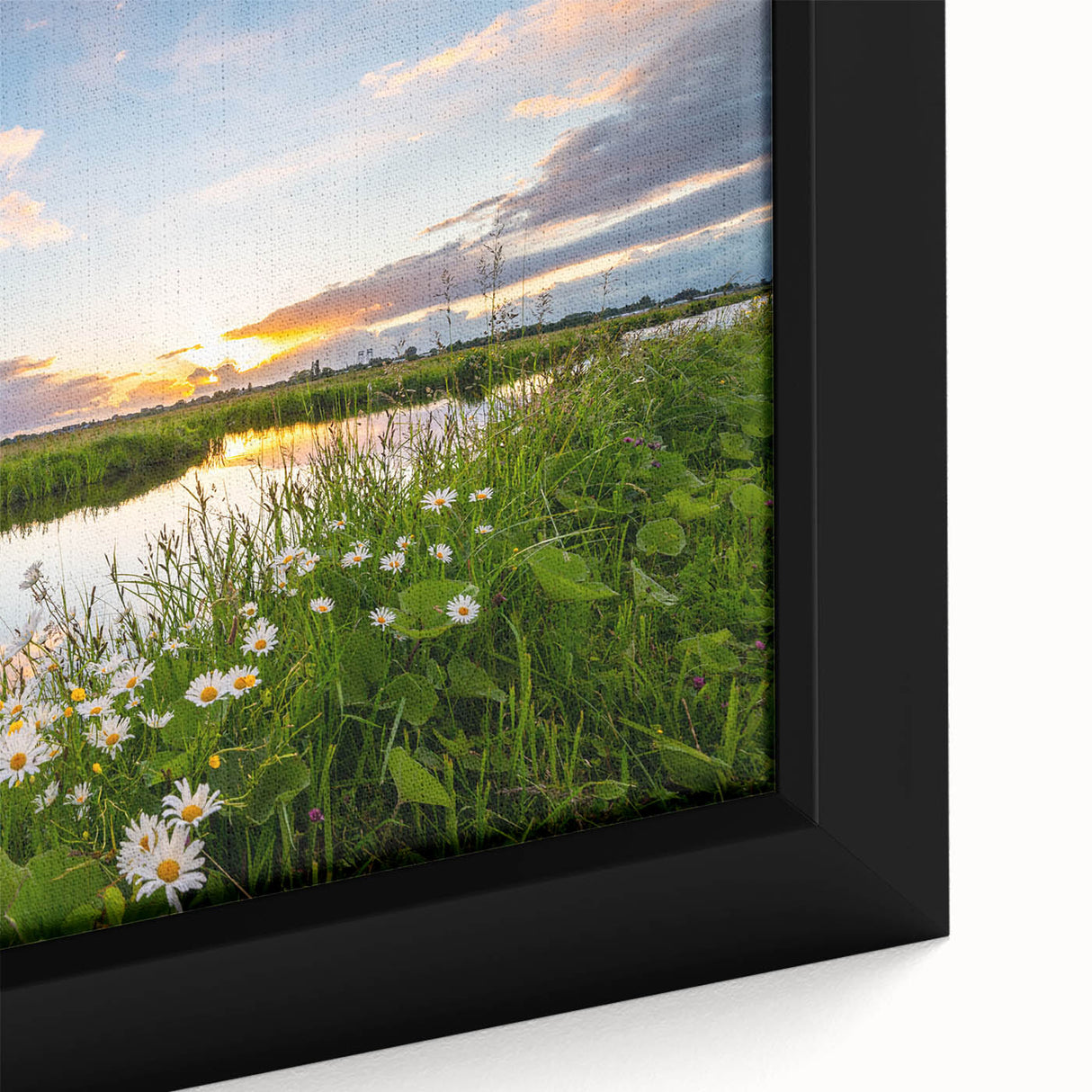 Close-up of a framed canvas wall art piece showcasing a serene lake landscape, featuring vibrant blues and greens, perfect for home decor.