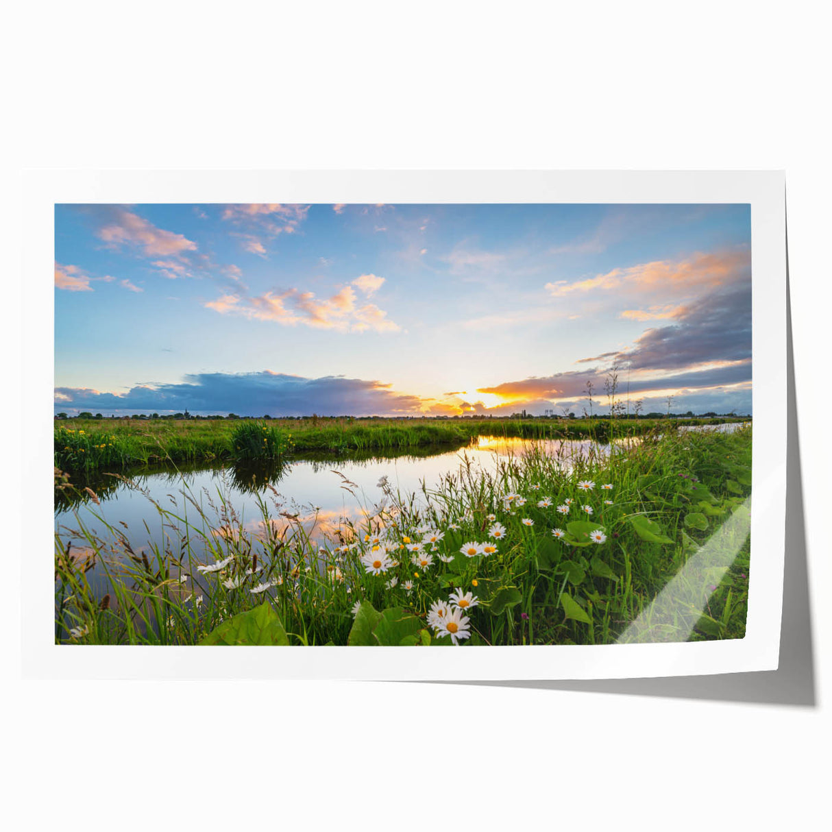 Scenic rolled wall art print showcasing a tranquil lake surrounded by lush greenery and mountains, perfect for home decor and nature-themed interiors.