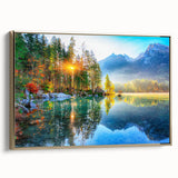 Framed canvas wall art featuring a serene landscape with a lake, surrounded by lush greenery and a golden frame, perfect for enhancing interior decor.