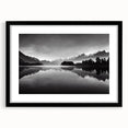 Framed black wall art featuring a serene lake landscape design with a mat, perfect for modern decor, emphasizing tranquility and nature.