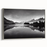 Framed canvas wall art showcasing a serene lake landscape with lush greenery, presented in a stylish silver frame, perfect for home decor enhancement.