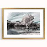 Framed wall art featuring a serene lake landscape design, with a gold frame and mat. Perfect for enhancing home decor with natural beauty and tranquility.