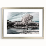 Framed silver wall art piece depicting serene lake landscapes, designed to enhance home decor with a modern touch, featuring a mat for an elegant finish.