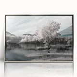 Framed wall art showcasing a serene lakeside landscape with vibrant colors and intricate details, set against a sleek silver frame, perfect for home decor.