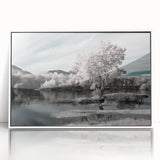 Framed wall art featuring a serene lake landscape design with vibrant colors, set in a sleek white frame, ideal for home decor enhancement and tranquility.