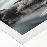 Rolled canvas wall art showcasing a serene lakeside landscape with vibrant colors and intricate details, ideal for home decor, packaged securely in a cardboard tube.