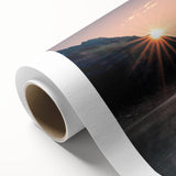 Rolled canvas artwork showcasing a serene lake landscape with vibrant blues and greens, ideal for home decor. Packaged securely in a cardboard tube for safe delivery.