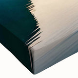 Close-up of a stretched canvas wall art piece showcasing a serene lake landscape design with vibrant blues and greens, perfect for home decor.