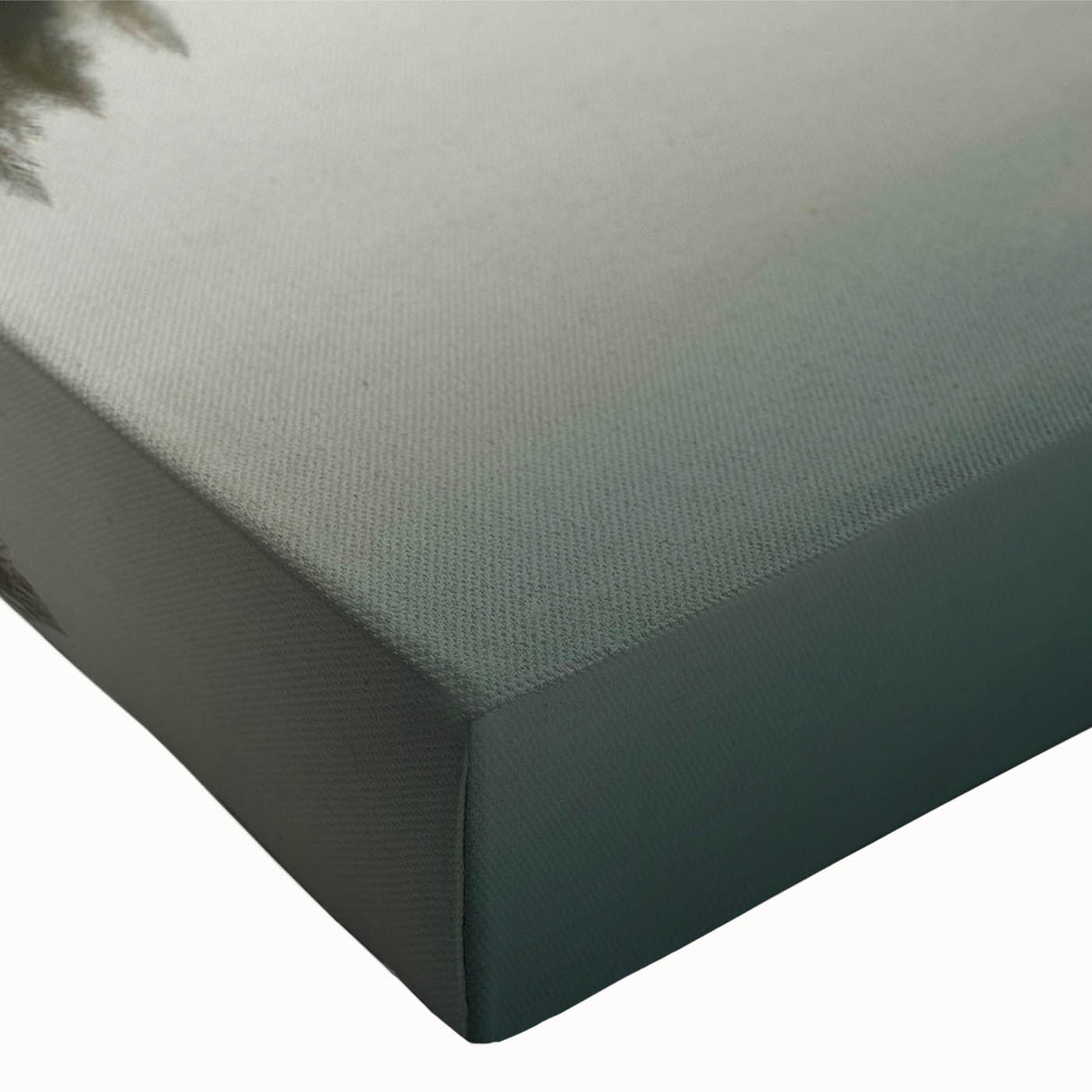 Close-up of a stretched canvas featuring a serene lake landscape design, showcasing vibrant blues and greens, ideal for enhancing home decor with nature-inspired art.