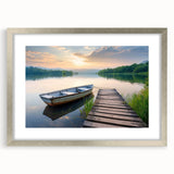 Framed wall art featuring a serene landscape with a tranquil lake scene, presented in a stylish silver frame with a mat, ideal for home decor and interior design.